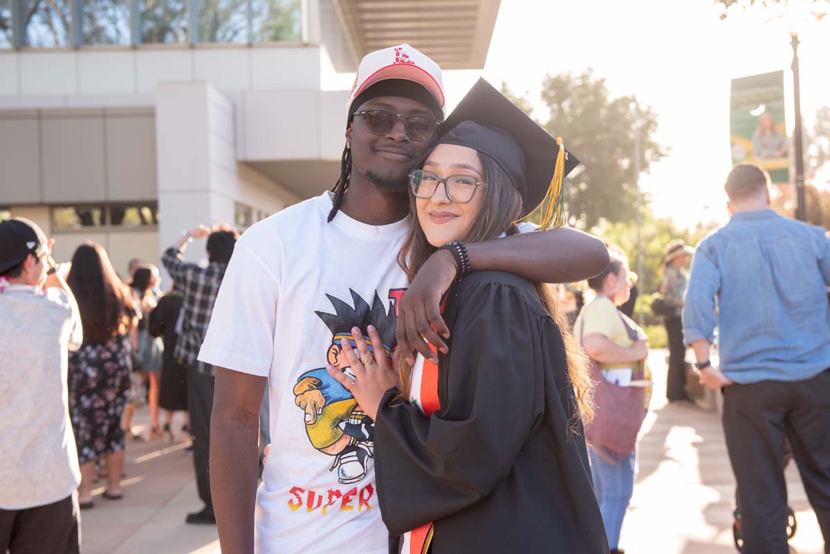 Grad recession at Commencement 2025 and pictures with family members.