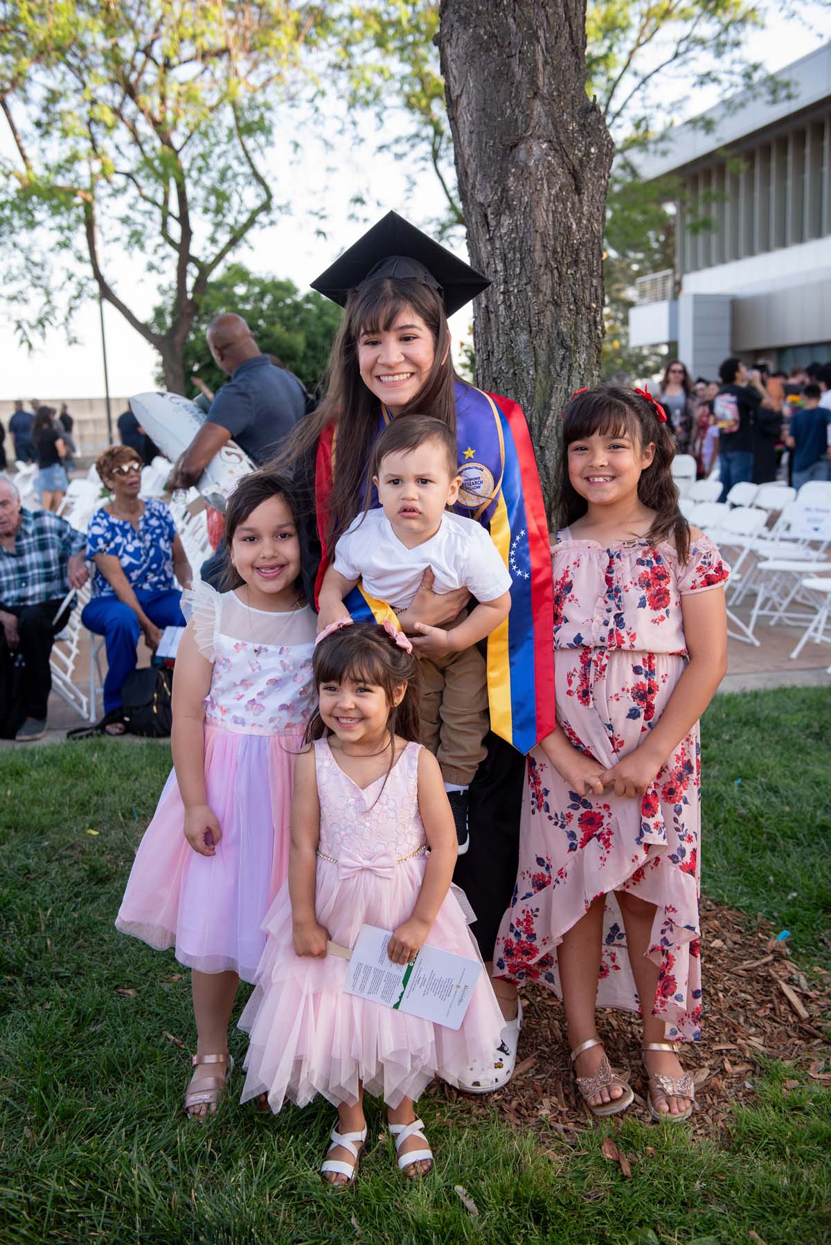 Grad recession at Commencement 2025 and pictures with family members.