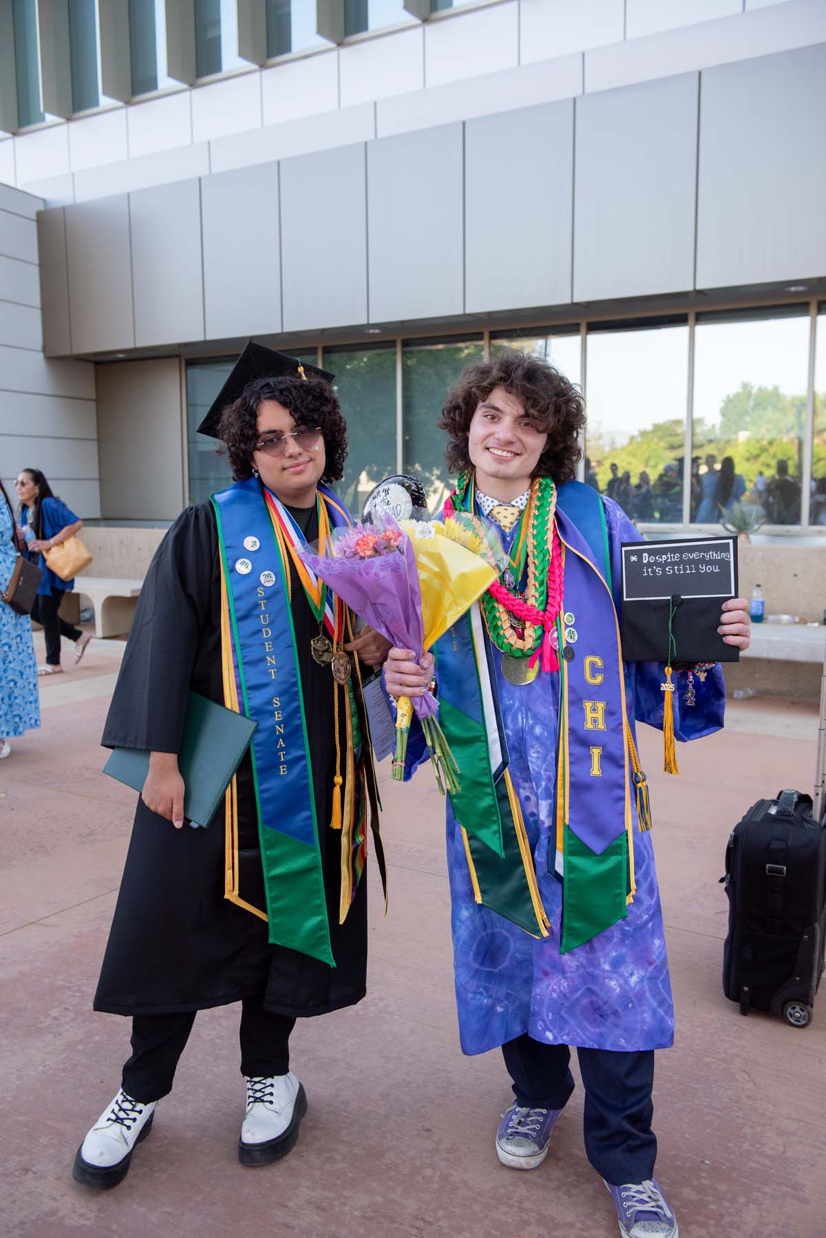 Grad recession at Commencement 2025 and pictures with family members.