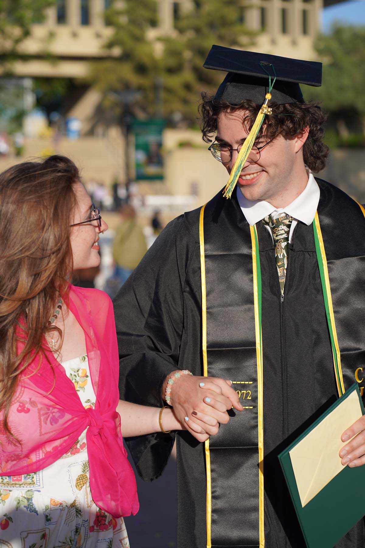 Grad recession at Commencement 2025 and pictures with family members.