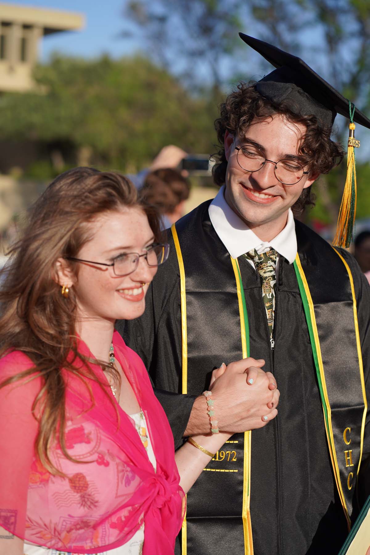 Grad recession at Commencement 2025 and pictures with family members.
