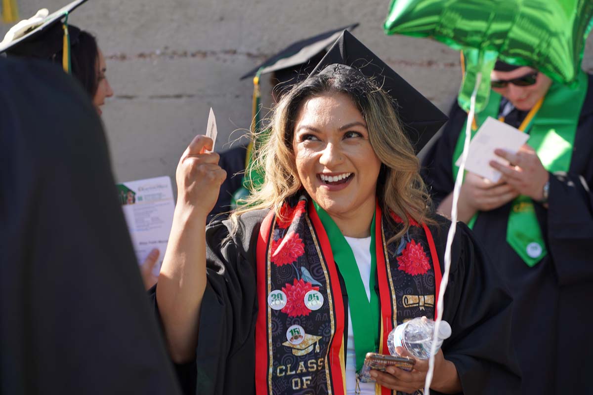 Grad recession at Commencement 2025 and pictures with family members.