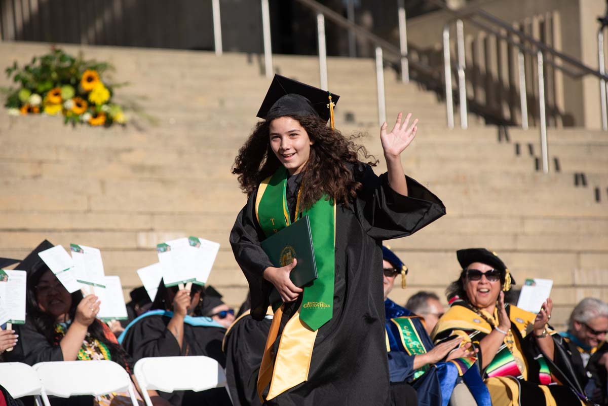 Grads walk across stage at CHC Commencement 2025.