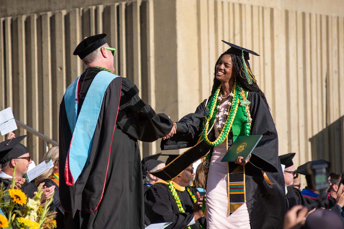 Grads walk across stage at CHC Commencement 2025.