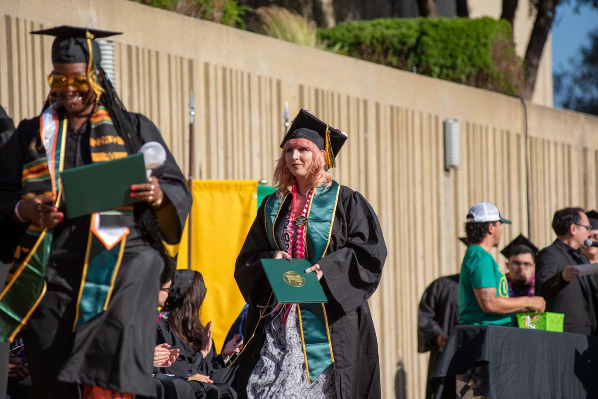 Grads walk across stage at CHC Commencement 2025.