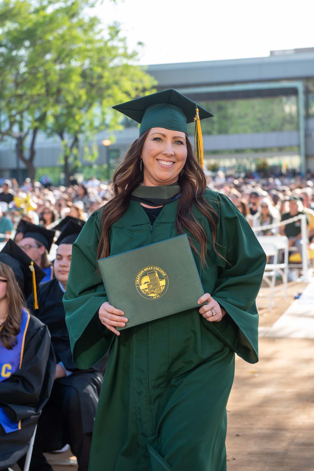 Grads walk across stage at CHC Commencement 2025.