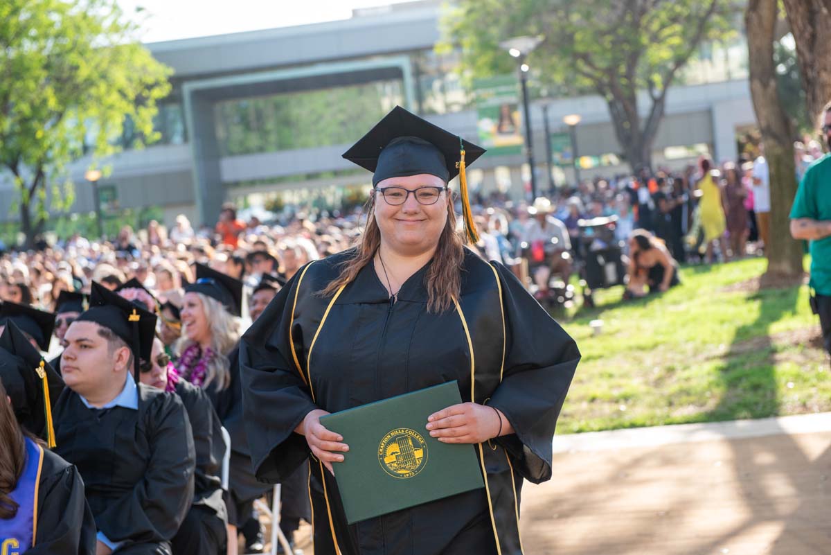 Grads walk across stage at CHC Commencement 2025.