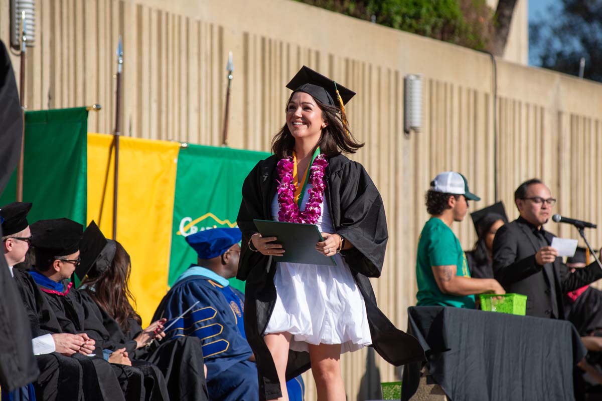 Grads walk across stage at CHC Commencement 2025.
