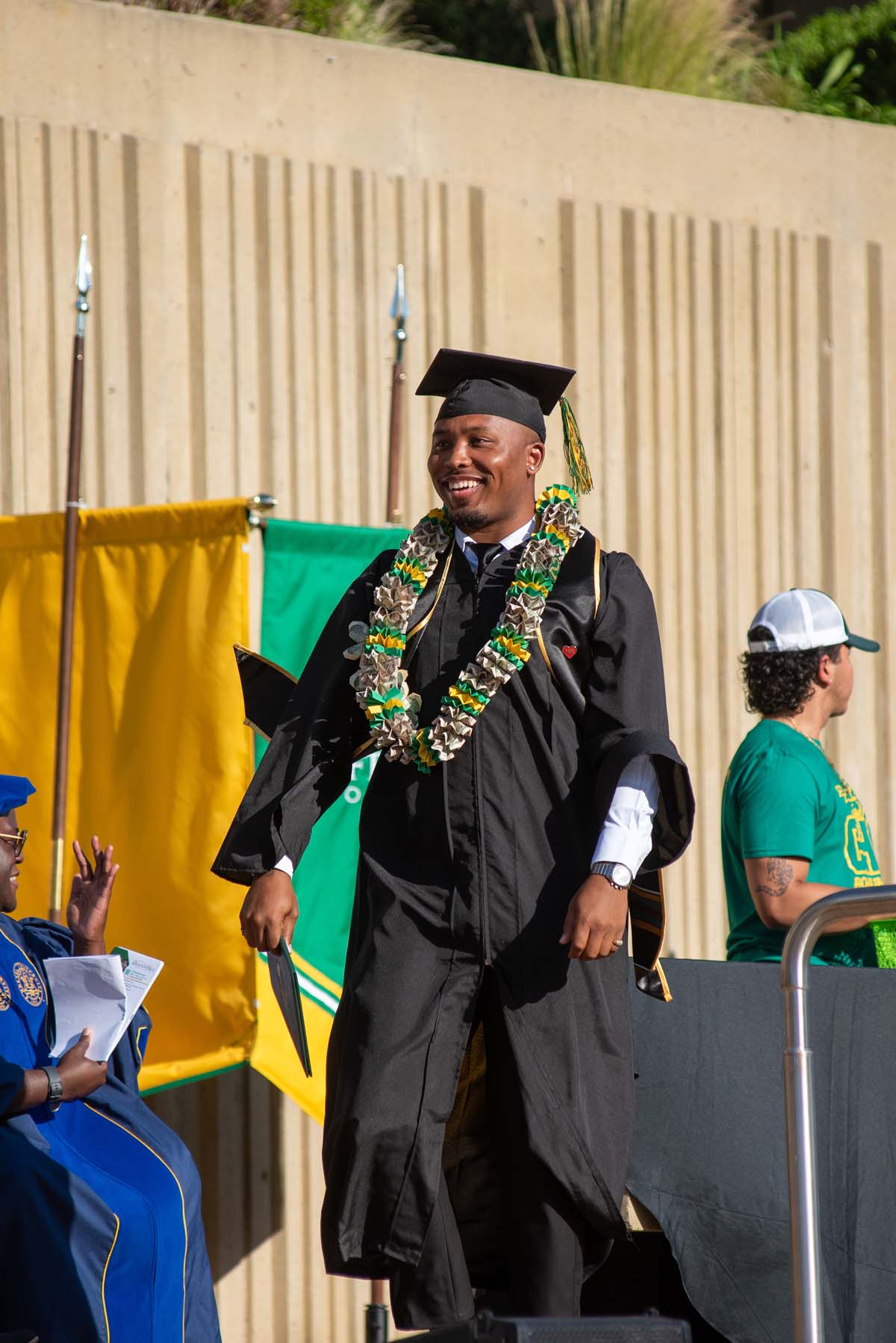 Grads walk across stage at CHC Commencement 2025.