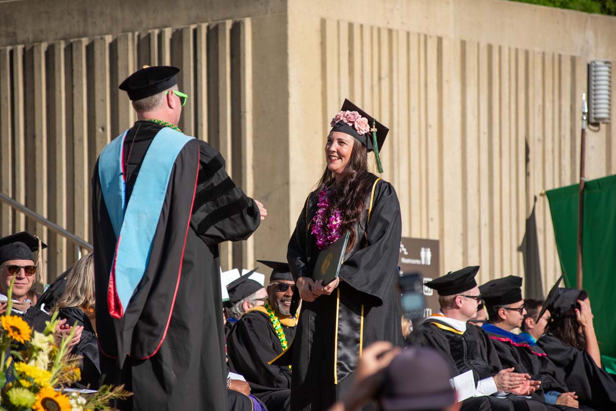 Grads walk across stage at CHC Commencement 2025.