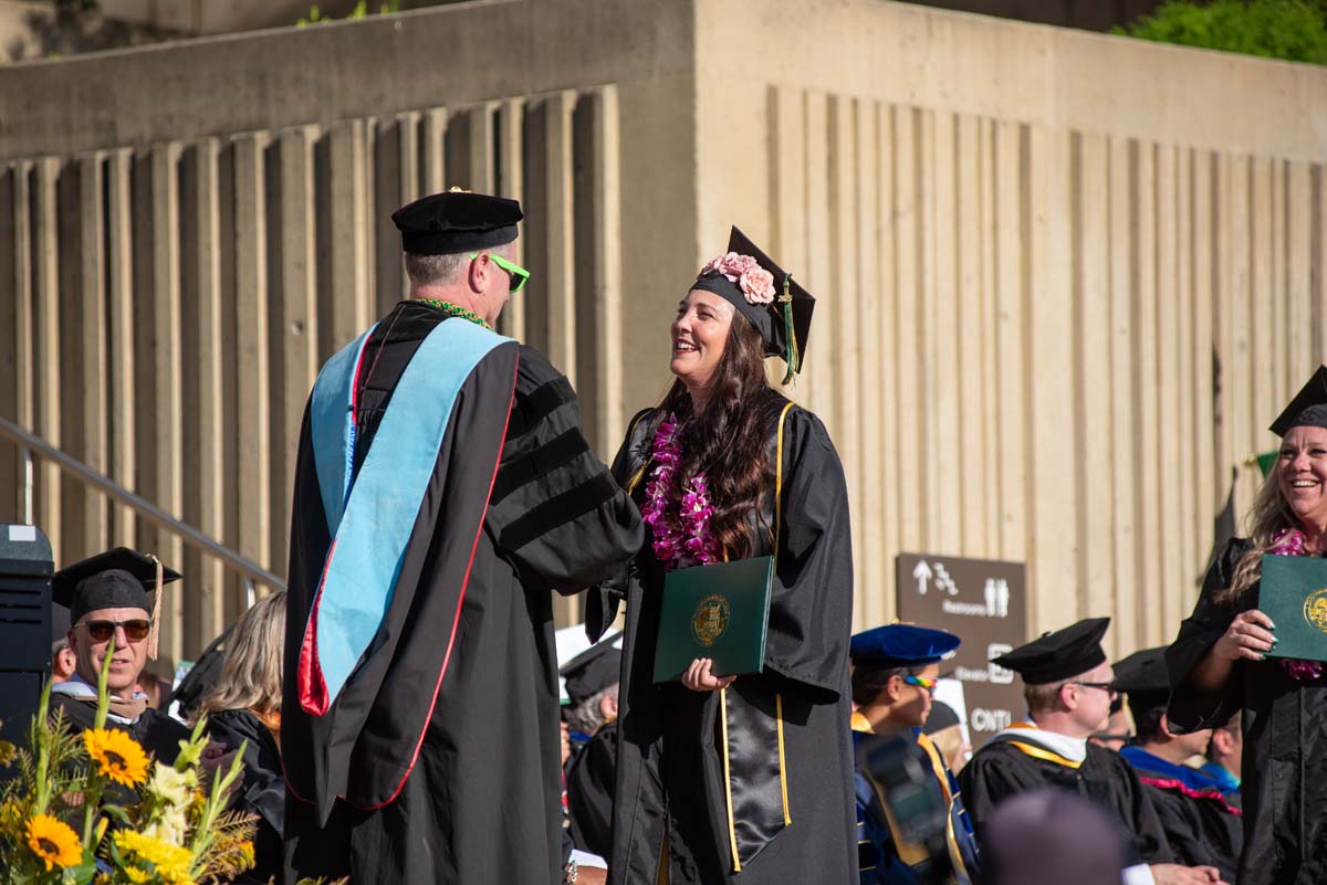 Grads walk across stage at CHC Commencement 2025.
