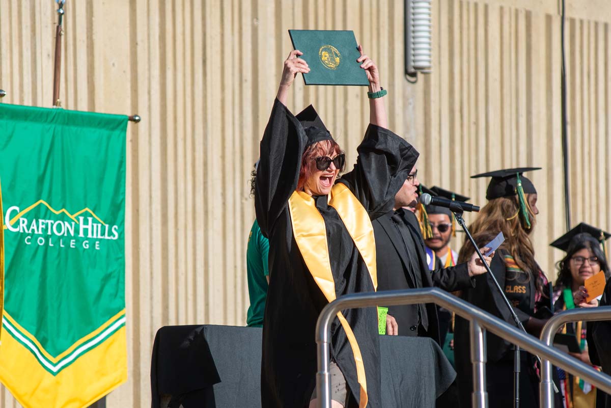 Grads walk across stage at CHC Commencement 2025.