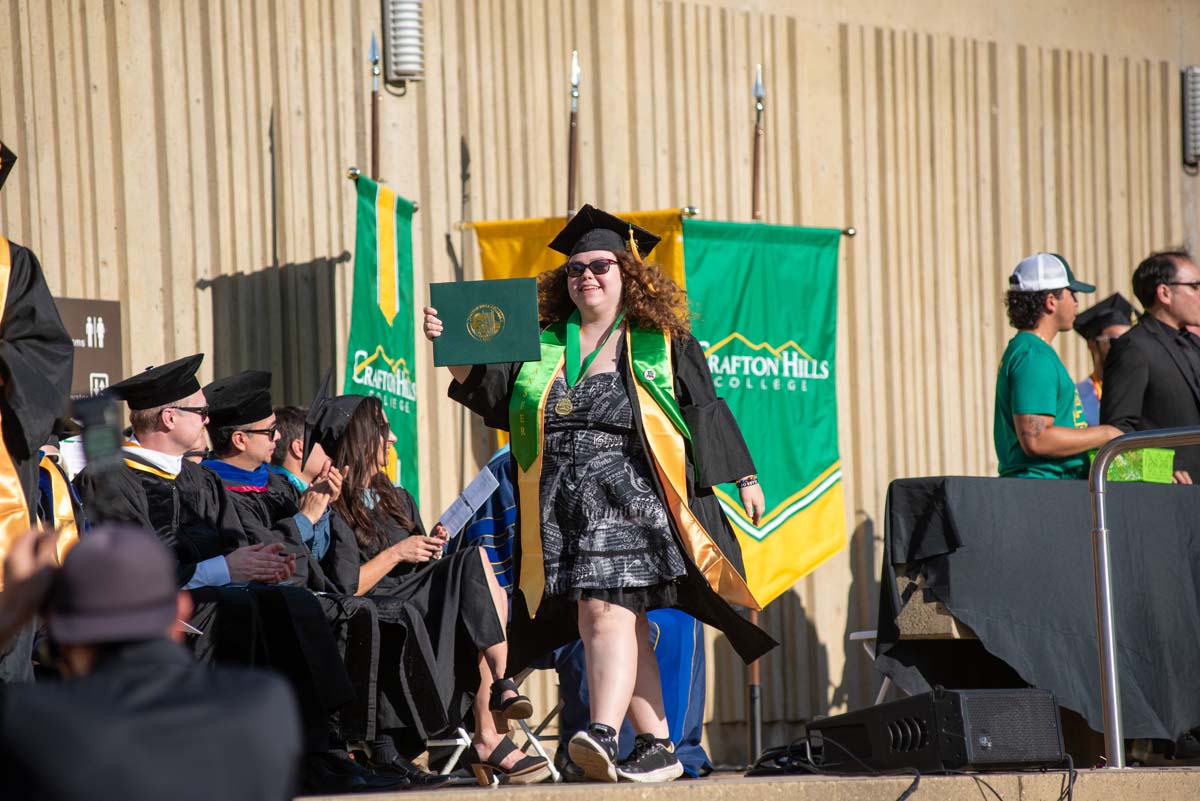 Grads walk across stage at CHC Commencement 2025.