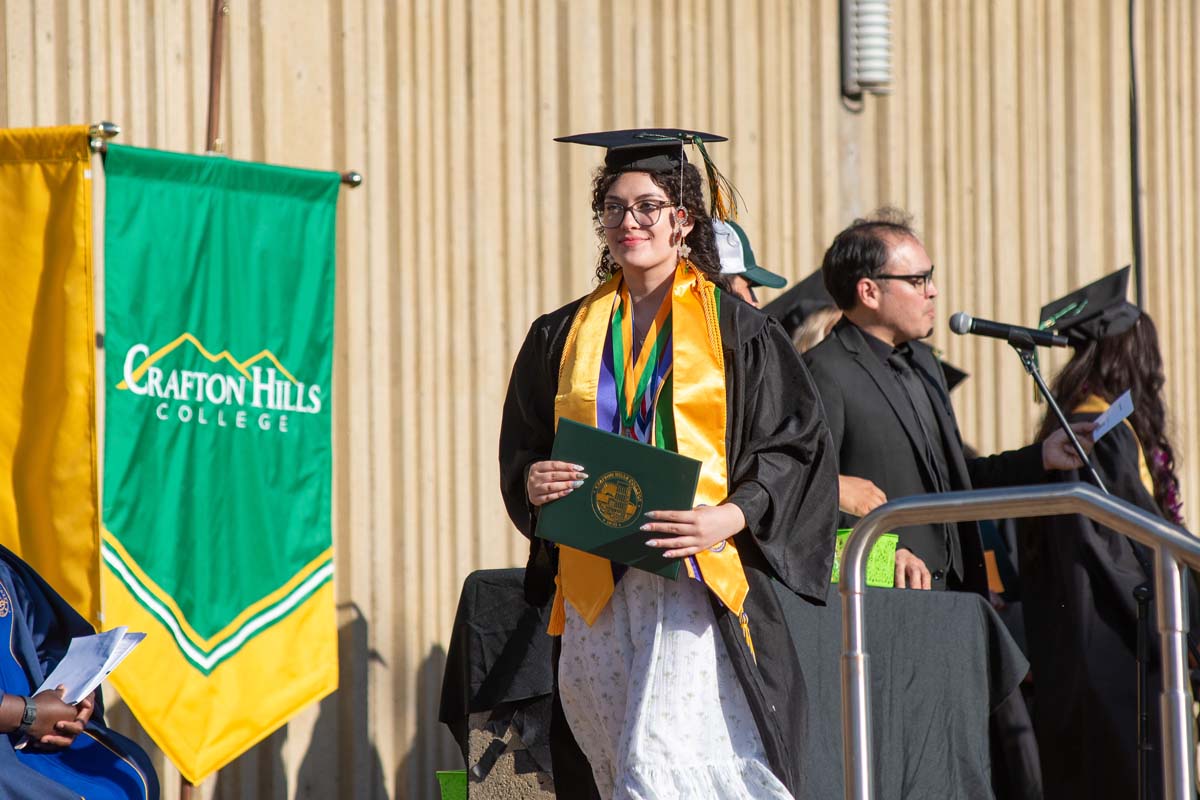 Grads walk across stage at CHC Commencement 2025.