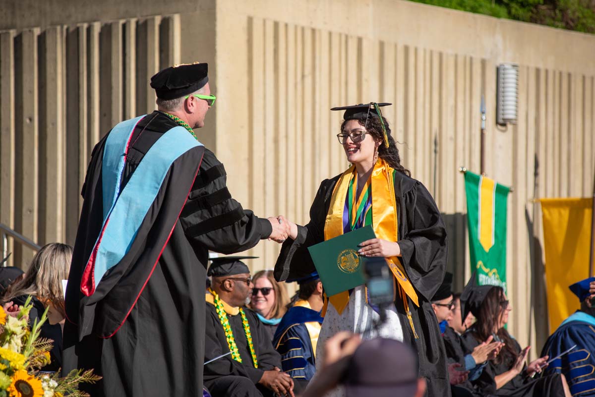 Grads walk across stage at CHC Commencement 2025.