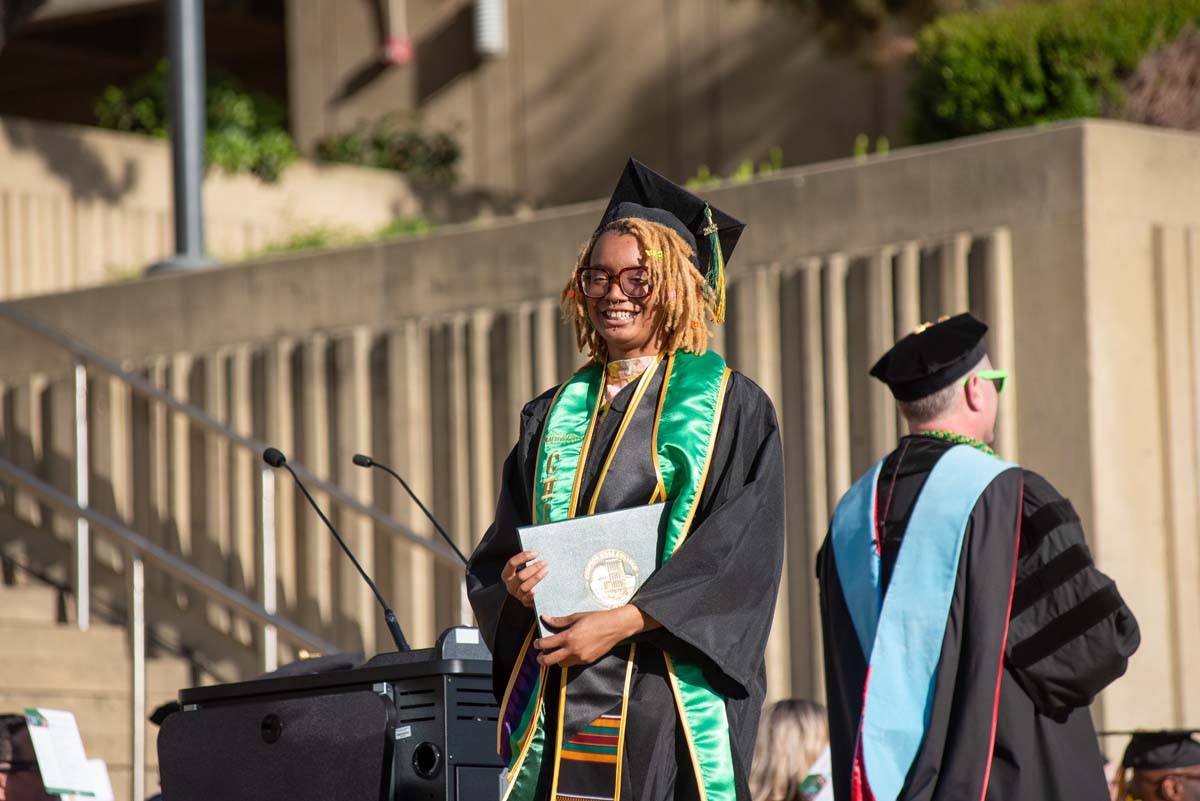 Grads walk across stage at CHC Commencement 2025.