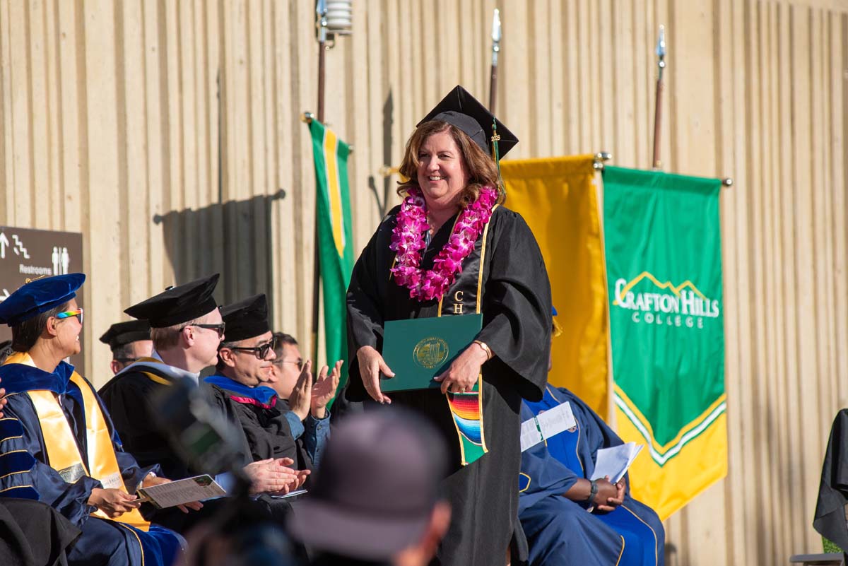 Grads walk across stage at CHC Commencement 2025.