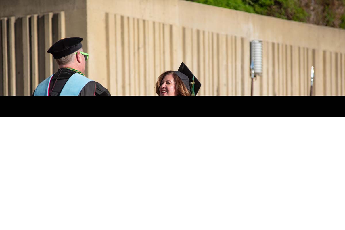 Grads walk across stage at CHC Commencement 2025.