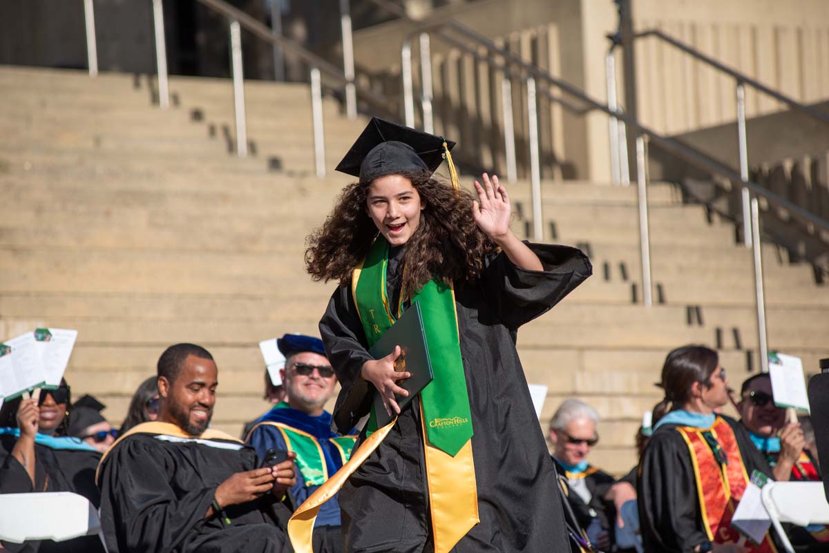 Grads walk across stage at CHC Commencement 2025.