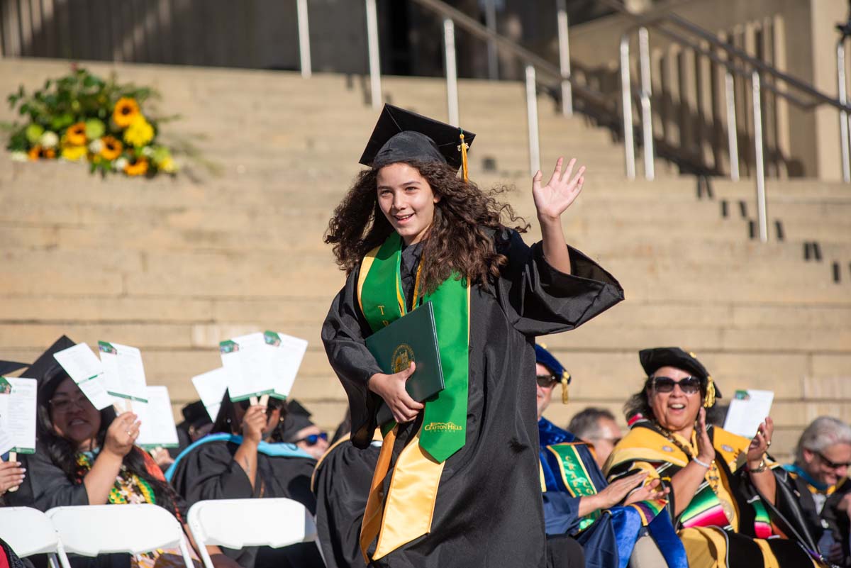 Grads walk across stage at CHC Commencement 2025.