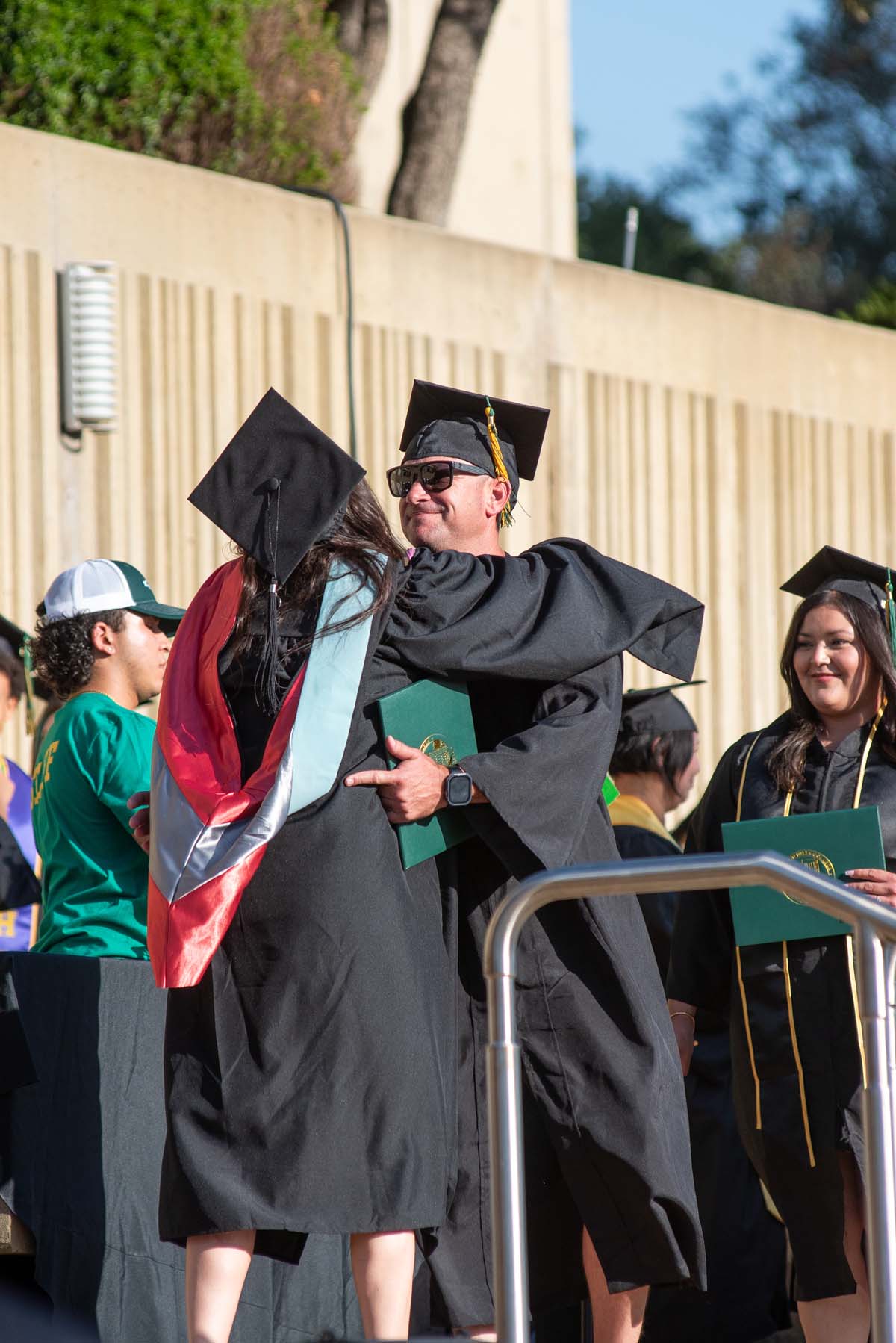 Grads walk across stage at CHC Commencement 2025.