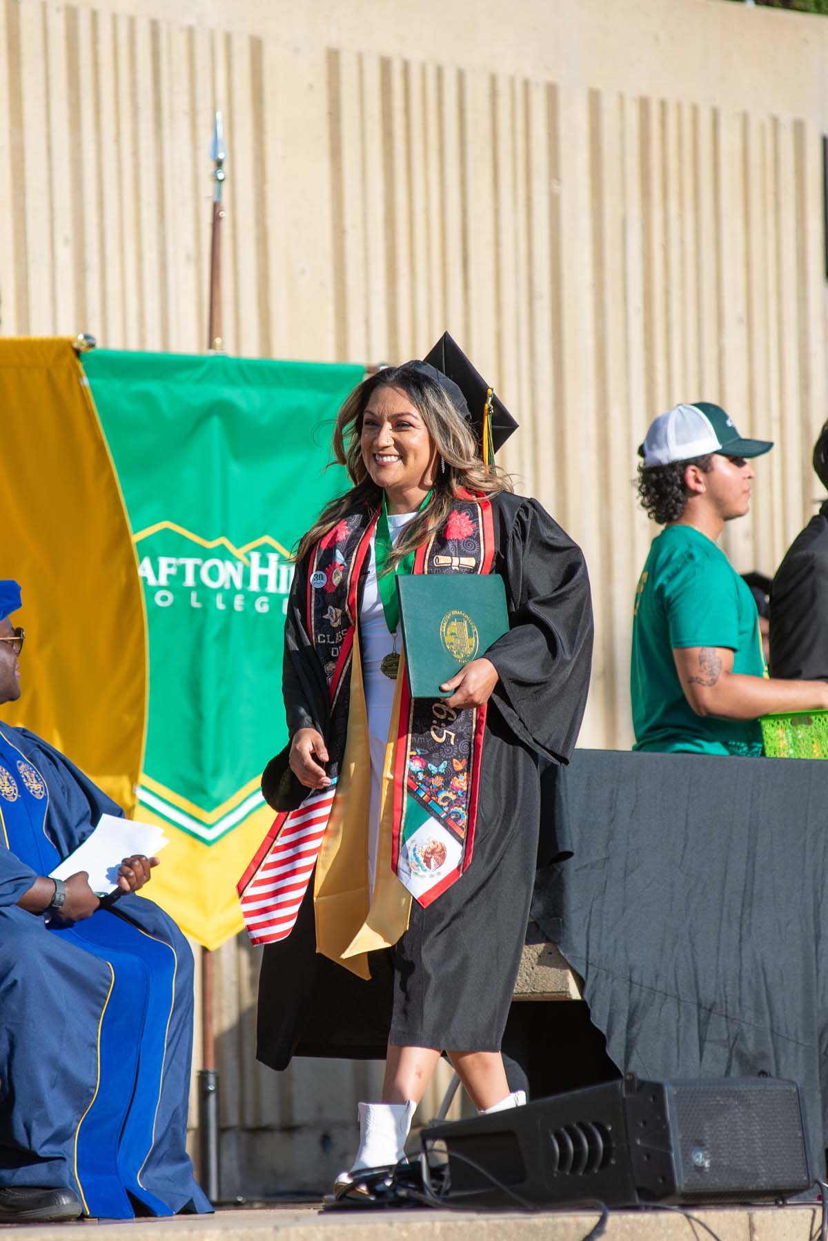 Grads walk across stage at CHC Commencement 2025.