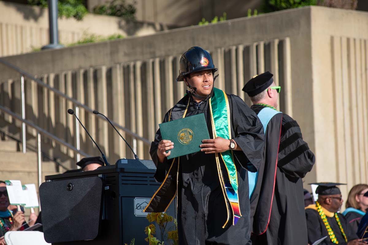 Grads walk across stage at CHC Commencement 2025.