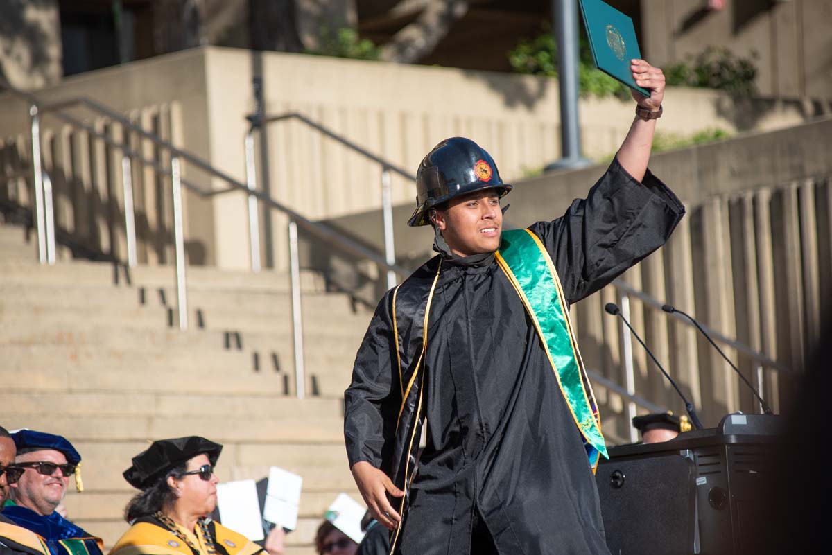 Grads walk across stage at CHC Commencement 2025.