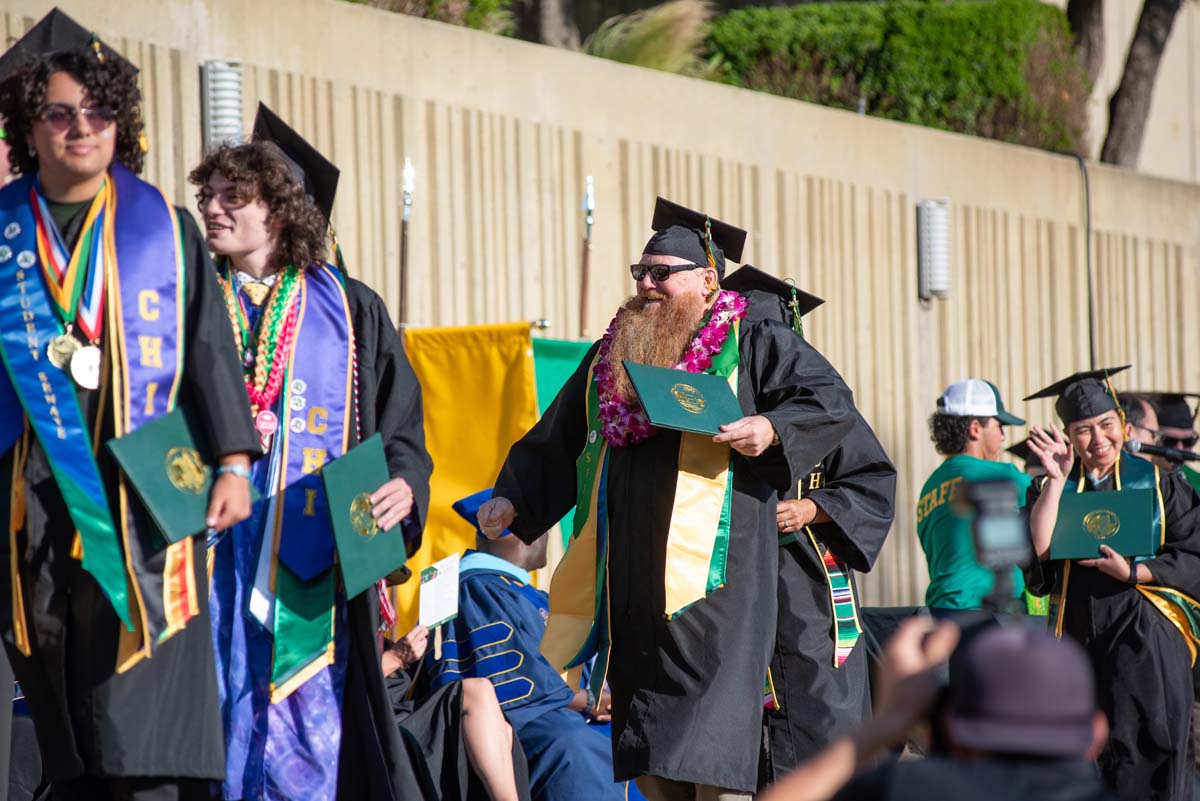 Grads walk across stage at CHC Commencement 2025.