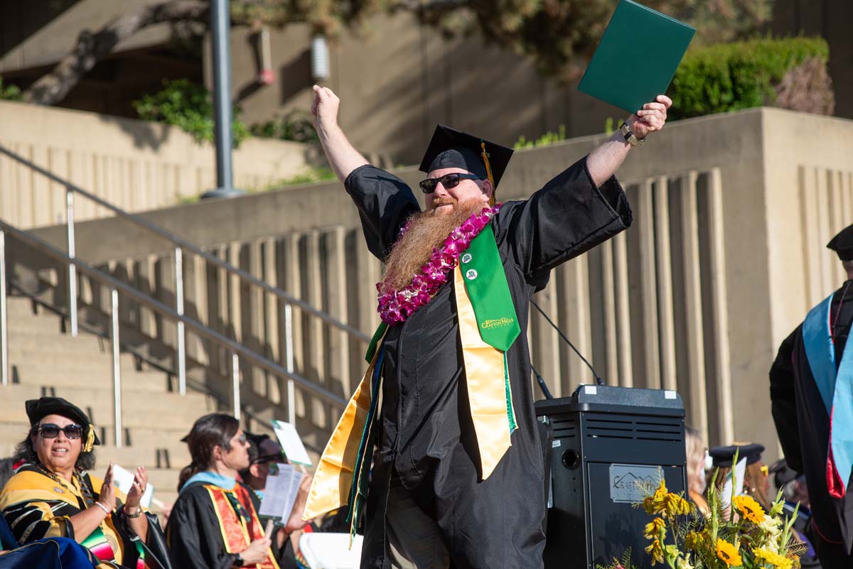 Grads walk across stage at CHC Commencement 2025.