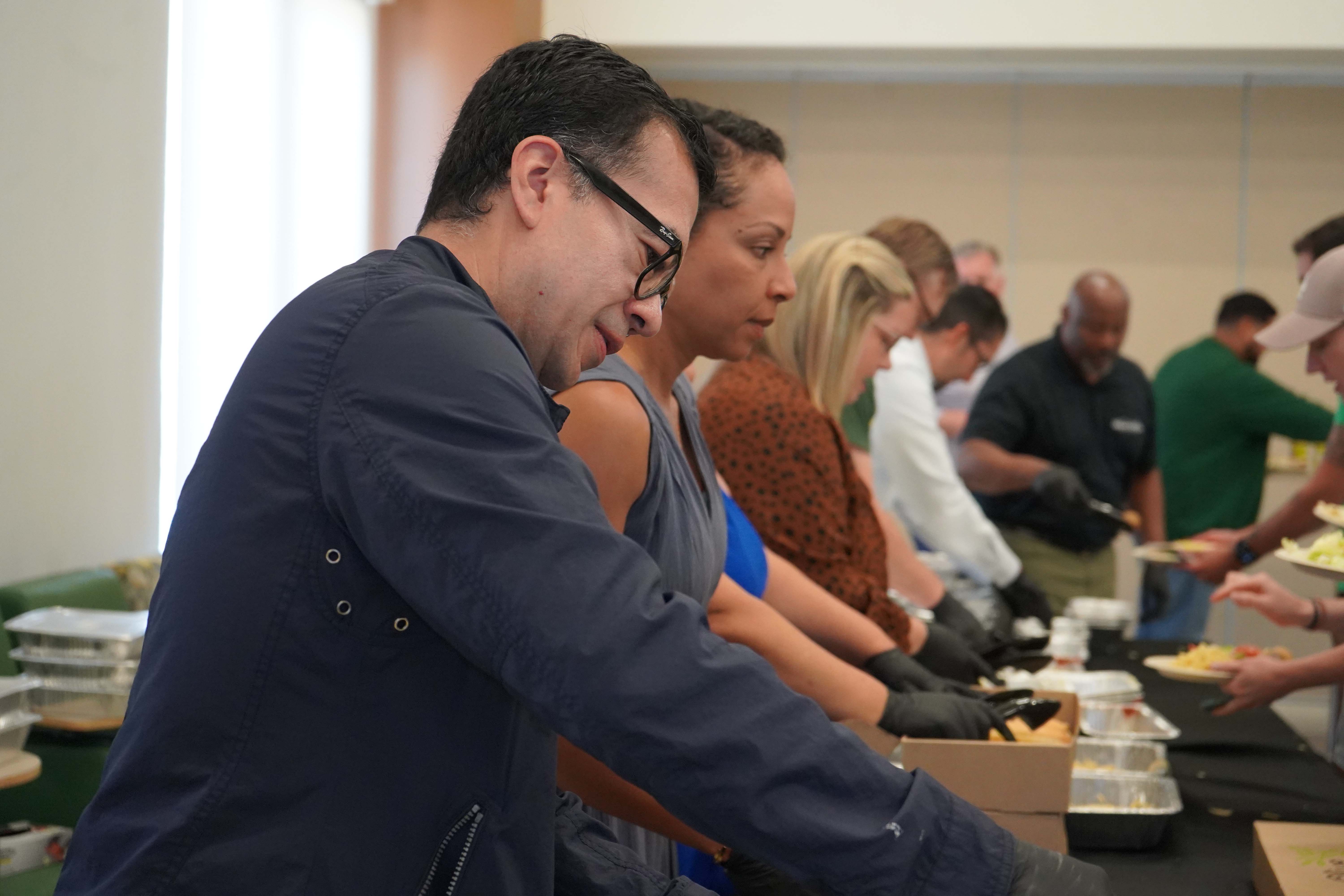 Employess attend a luncheon presented by CHC administrators.