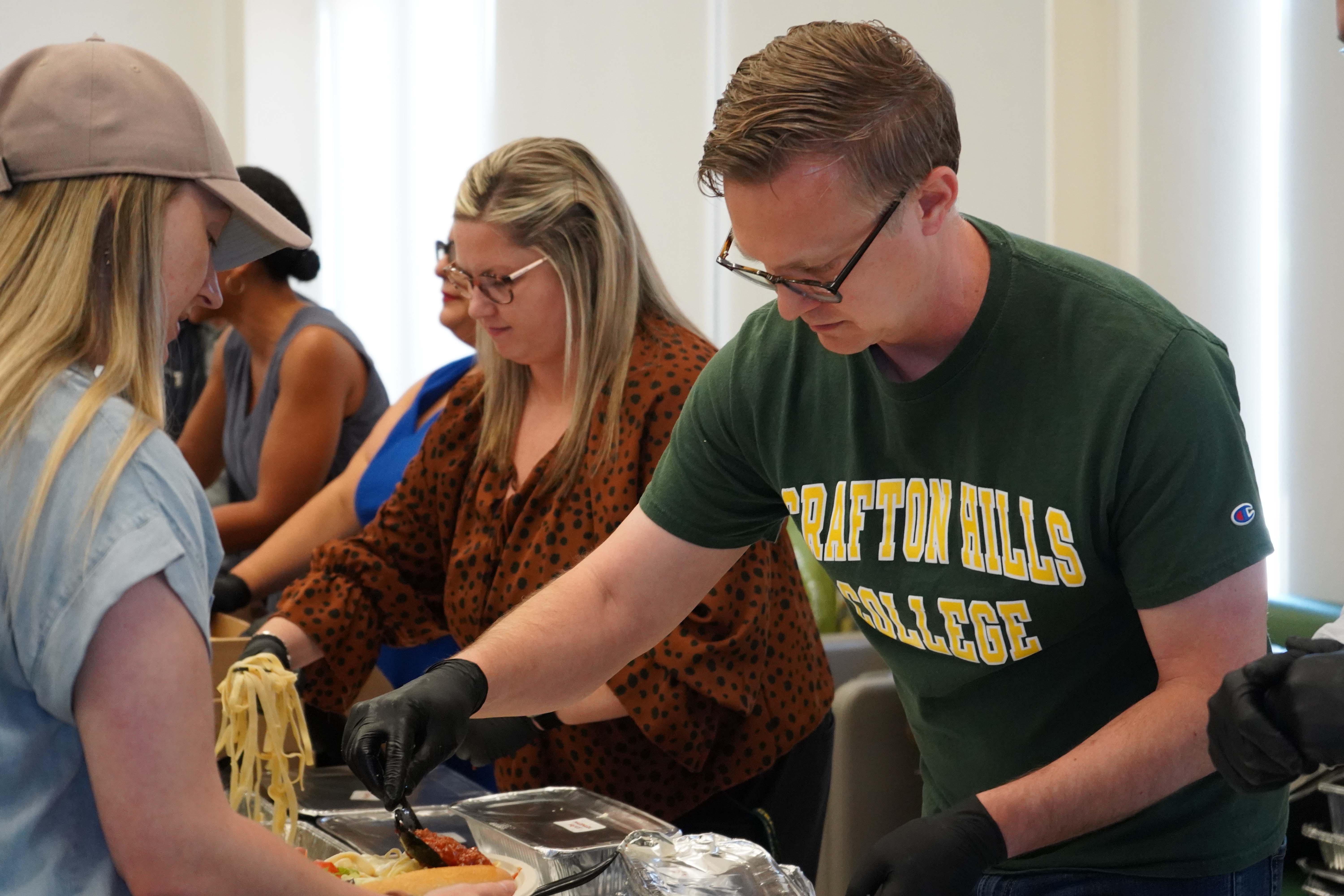 Employess attend a luncheon presented by CHC administrators.