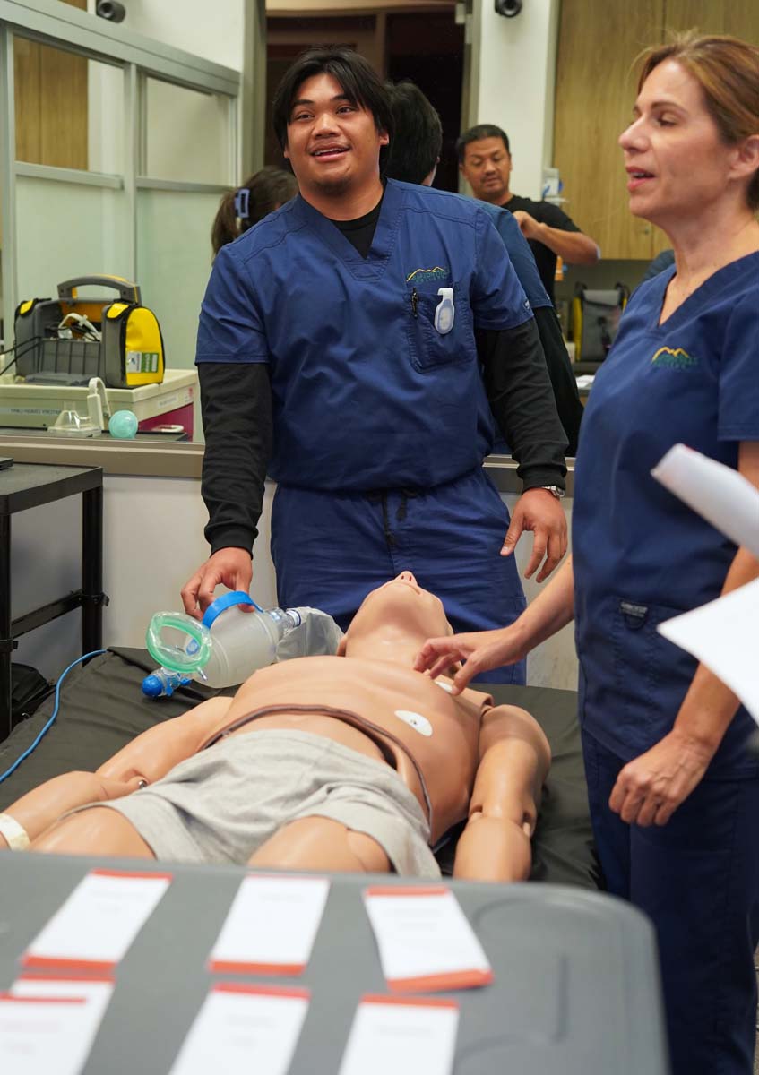 Paramedics with CPR Dummy