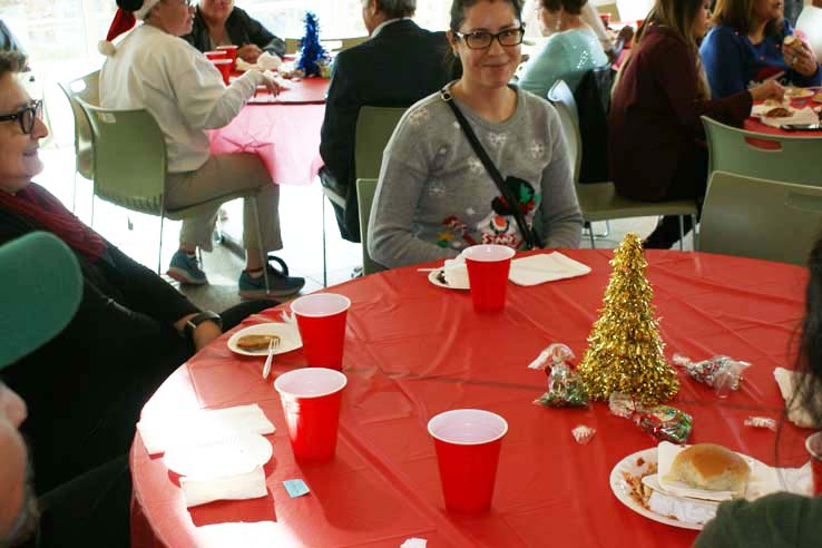 Faculty and staff at the holiday party.