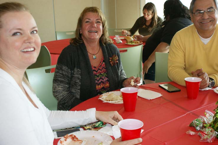 Faculty and staff at the holiday party.