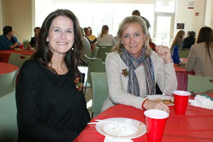 Faculty and staff at the holiday party.