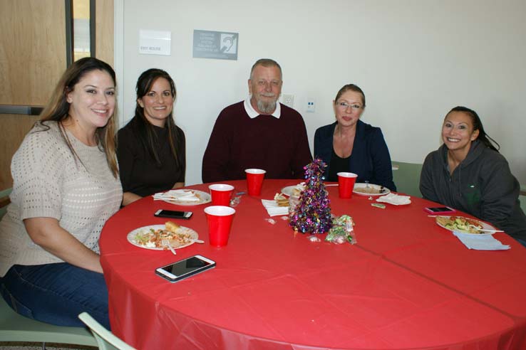 Faculty and staff at the holiday party.