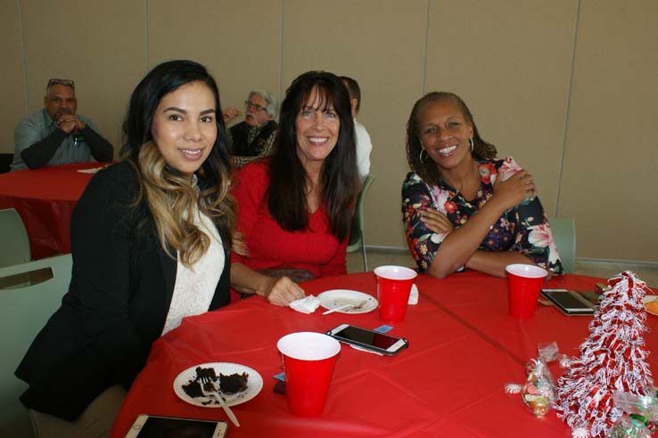 Faculty and staff at the holiday party.