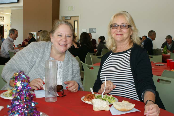 Faculty and staff at the holiday party.