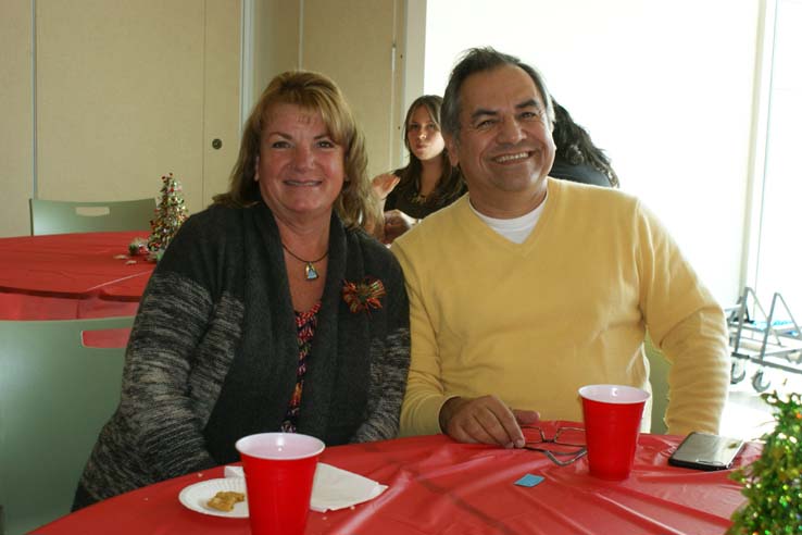 Faculty and staff at the holiday party.