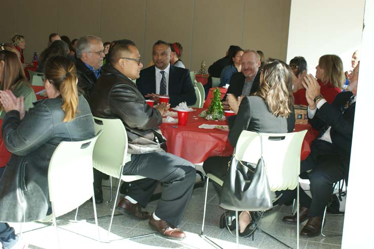 Faculty and staff at the holiday party.