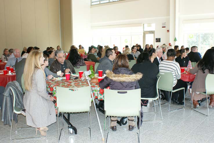 Faculty and staff at the holiday party.