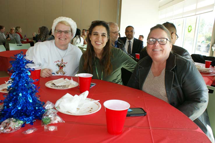 Faculty and staff at the holiday party.