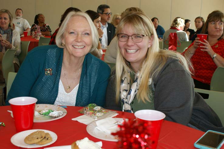 Faculty and staff at the holiday party.