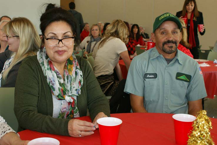 Faculty and staff at the holiday party.