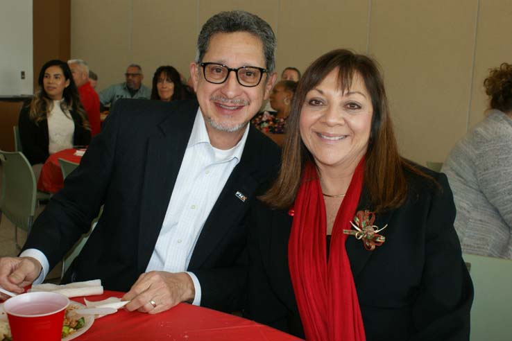 Faculty and staff at the holiday party.