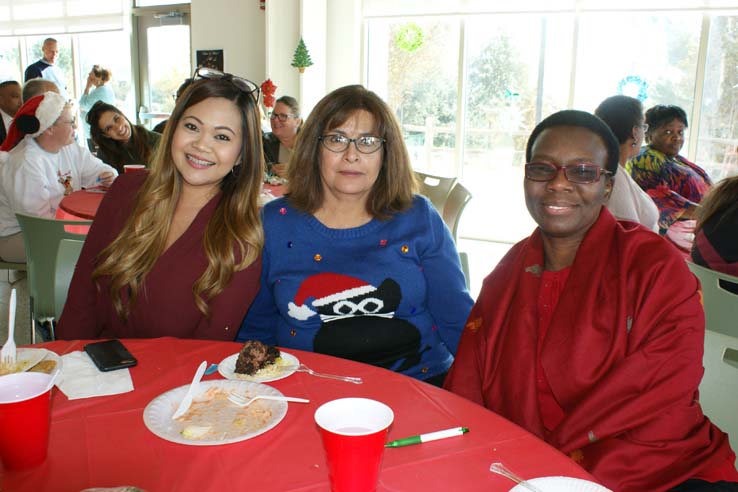 Faculty and staff at the holiday party.