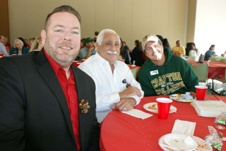 Faculty and staff at the holiday party.