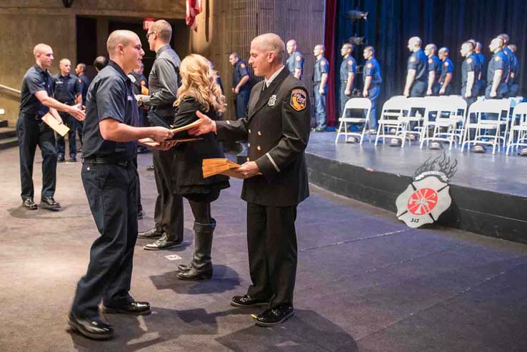 Students at Fire Academy graduation