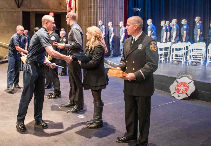 Students at Fire Academy graduation